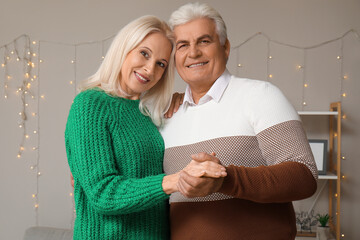 Wall Mural - Happy mature couple having date at home