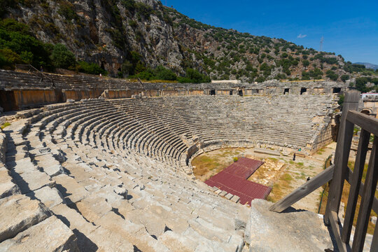 Scenic view of remains of Roman theater in ancient Lycian settlement of Myra, in modern Turkish town of Demre, at foot of rocky mountain on sunny spring day