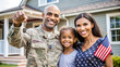 © Matan - US military man with family showing keys from house, benefits in crediting