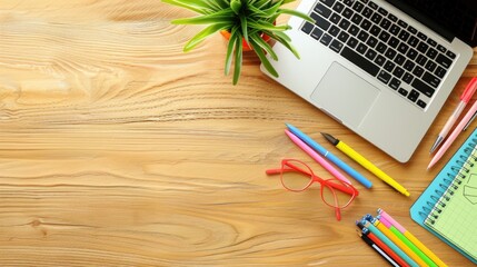 Wall Mural - A rectangular wooden desk with a laptop, notebooks, pencils, and a potted plant. The flooring has a grass pattern, giving a natural and artistic touch to the space AIG50