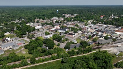 Wall Mural - Historic Kingstree, South Carolina downtown buildings, architecture, streets, business, homes in small town USA in the South with shade trees by Black River on Sunny afternoon in summer