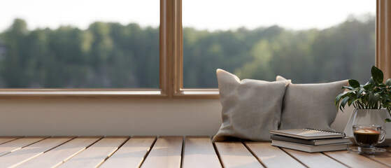 Wall Mural - A wooden bench against the window in a minimalist living room on a sunny day.