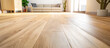 © oswasa - worker installing modern wood flooring in an empty room