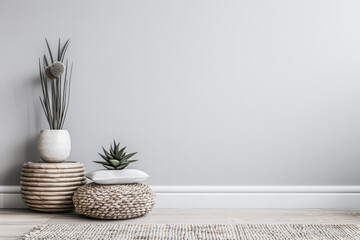 Minimalist zen living room interiors in neutral colors with natural lighting coming from a window. Residential interior design composition for Real Estate.