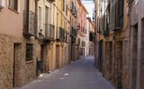 Fototapeta Uliczki - Narrow streets and rustic stone houses in the medieval village of Molina de Aragon.