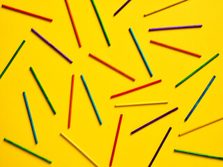 Aufkleber - Abstract geometric yellow background with colorful cylinder stick shapes.