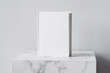 © kite_rin - Blank white book mockup on gray background, blank empty book mock-up template