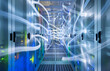 © Westend61 - Illuminated network waves in server room of data center