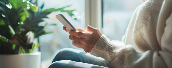 Closeup of a person using a smartphone for work tasks, home environment, clear and professional photo
