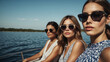 © KraPhoto - Three Stylish Women Enjoying a Sunny Day on a Boat with Scenic Water View
