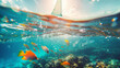 © Joyce - Sailing boat above and sea life fishes with coral beneath underwater in sea.