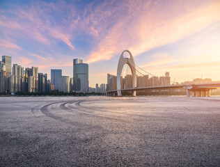 Wall Mural - Asphalt road square and city skyline with modern buildings scenery at sunrise in Guangzhou