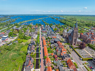 Wall Mural - Aerial from the village Vinkeveen at the Vinkeveense Plassen in the Netherlands