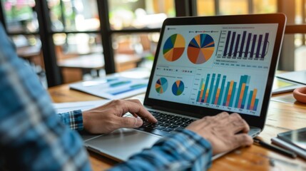 Poster - An overhead view of a financial analyst analyzing pie charts and graphs on a laptop screen, focusing on investment strategies.