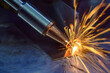 © Pixel_B - Close up scene the laser welding process by hand held laser welding machine.
