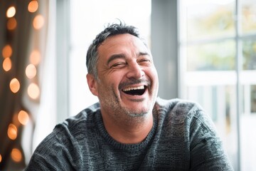 Wall Mural - Portrait of a joyful man in his 40s laughing over modern minimalist interior