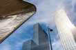 © yaqui_villegas - This image features a dynamic view of contemporary skyscrapers towering under the blue sky of Rotterdam, Netherlands, showcasing Europe's modern urban landscape