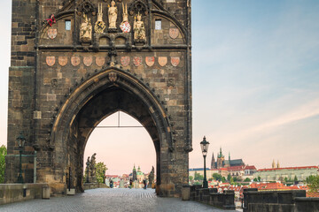 Wall Mural - Old Town Bridge Tower at the beginning of the Charles Bridge and with Prague caste on the background, Prague, Czech Republic, Europe.