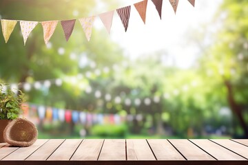 Wall Mural - Empty Wooden Tabletop With Festive Flags and a Blurred Garden Background