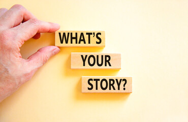 Fototapete - Storytelling and what is your story symbol. Concept words What is your story on blocks. Beautiful white background. Businessman hand. Business storytelling and what is your story concept. Copy space.