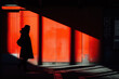 © DeepMind - Minimalist Street Photography Featuring Silhouette Against Red Wall