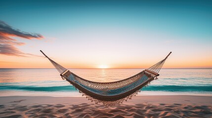 Wall Mural - A hammock hanging over the ocean at sunset
