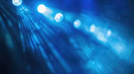 Poster - Blurry spotlights shining on a blue abstract background