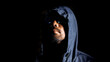 © STOCK PHOTO 4 U - Mysterious Hooded Figure in Dark Lighting with Sunglasses and Beard