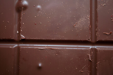 Wall Mural - Smooth texture of milk chocolate.Chocolate photo background.