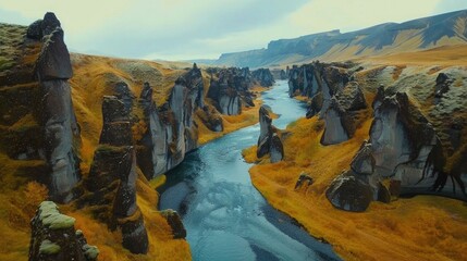 Wall Mural - View from flying drone of Fjadrargljufur canyon and river. Colorful autumn scene of South east Iceland, Europe. Beauty of nature concept background.