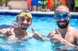 © Viga - Portrait for males having fun and cheerful smile at the pool during there trip on summer