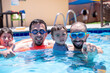 © Viga - Portrait for males having fun and cheerful smile at the pool during there trip on summer