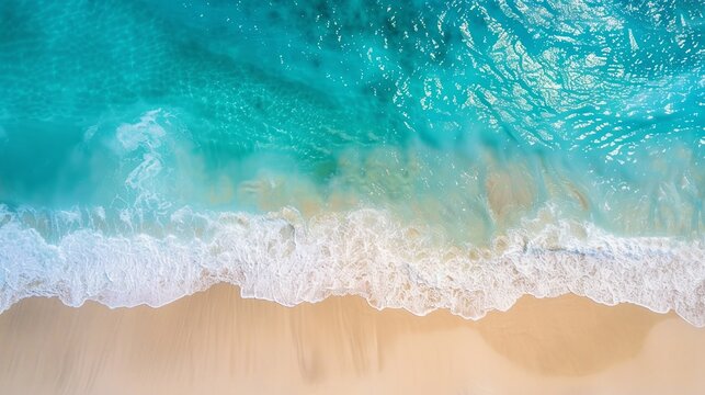 aerial view of tide blue sea water and sandy beach