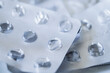 © Sopear - Used empty packaging from pills close up. Many different pill blister silver pharmaceutical packaging foils. Drug shortage concept.