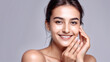 © Art - Woman smiling while touching her flawless glowy skin with copy space for your advertisement, skincare