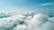 © CreativeBro - Beautiful aerial view of nature with white clouds and blue sky captured from a drone on a sunny day from high altitude in the front perspective