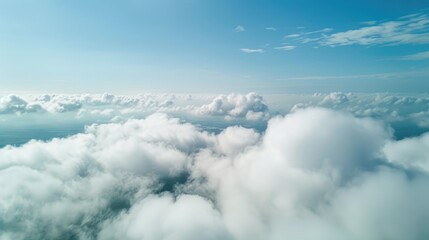 beautiful aerial view of nature with white clouds and blue sky captured from a drone on a sunny day 