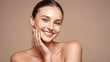 © Art - Woman smiling while touching her flawless glowy skin with copy space for your advertisement, skincare