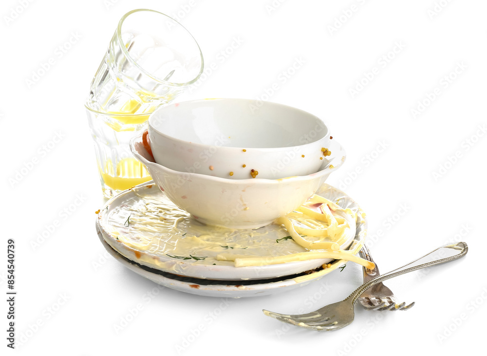 Dirty dishes on white background
