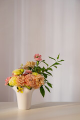 Wall Mural - beautiful bouquet in white vase in sunlight