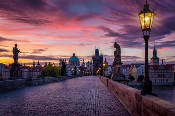 Wall Mural - Beautiful summer sunrise view of the Charles Bridge and skyline of Prague, Czech Republic