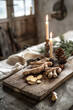 © Lidok_L - A wooden cutting board with a pile of ginger and some candles on it
