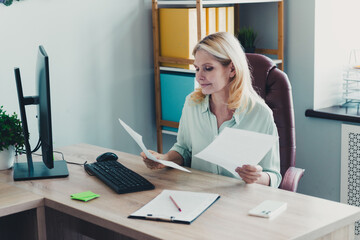 Sticker - Photo of charming woman reading document project cv resume in modern office room indoors workplace workshop