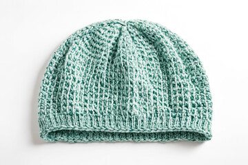 Wall Mural - Close up of a green knitted beanie hat