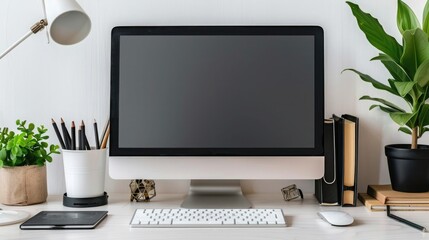 Close up Minimalistic workspace with computer modern designer desktop with blank computer screen, office equipment decorations on table. Mock up