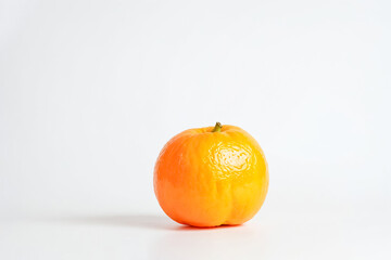Wall Mural - A Single Orange on a White Background