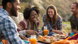 © Cozy Art - Friends enjoying a picnic in nature with food and drinks and copy space