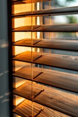 Poster - A close-up view of a window with wooden blinds, great for interior design or architecture concepts