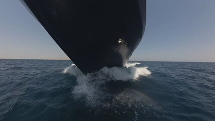 Wall Mural - Bow of luxury private motor yacht under way sailing at sea