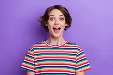 Poster - Photo of attractive funny excited lady looking on camera see big huge sales wear striped shirt isolated purple color background